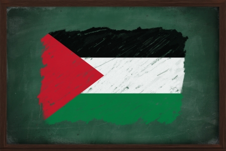 Palestine flag painted with color chalk on old blackboardの写真素材