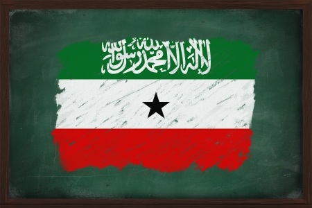 Somaliland flag painted with color chalk on old blackboardの写真素材