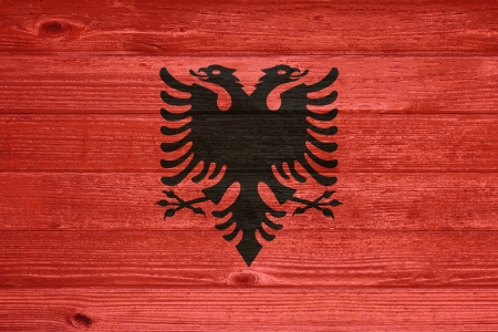 Albania Flag painted on old wood plank backgroundの写真素材