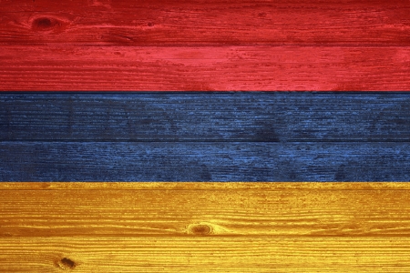 Armenia Flag painted on old wood plank backgroundの写真素材