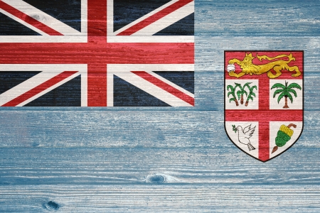 Fiji Flag painted on old wood plank backgroundの写真素材
