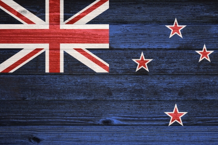 New Zealand Flag painted on old wood plank backgroundの写真素材