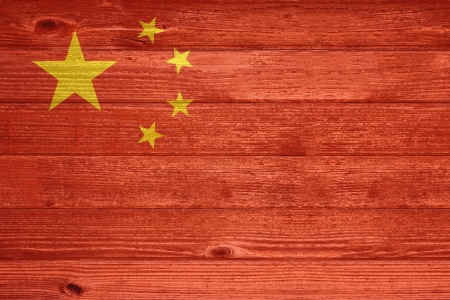 People's republic of China Flag painted on old wood plank backgroundの写真素材