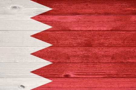 Bahrain Flag painted on old wood plank backgroundの写真素材