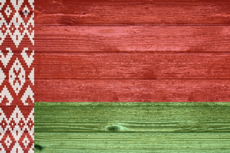 Belarus Flag painted on old wood plank backgroundの写真素材
