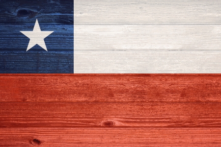 Chile Flag painted on old wood plank backgroundの写真素材
