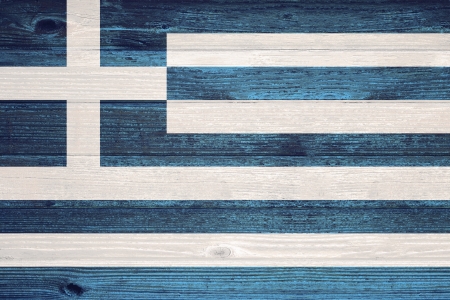 Greece Flag painted on old wood plank backgroundの写真素材