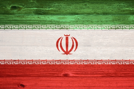 Iran Flag painted on old wood plank backgroundの写真素材