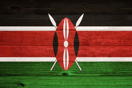 Kenya Flag painted on old wood plank backgroundの写真素材