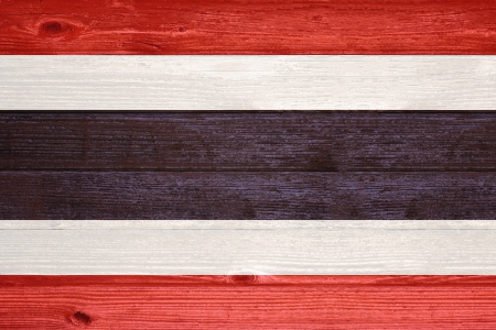 Thailand Flag painted on old wood plank backgroundの写真素材