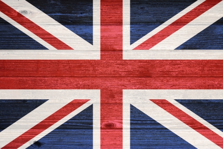 United Kingdom Flag painted on old wood plank backgroundの写真素材