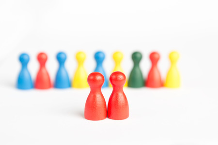 Homosexual (female) marriage concept with game figurines on whiteの写真素材