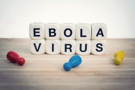 Ebola Virus concept with dead pawns near term spelled outの写真素材