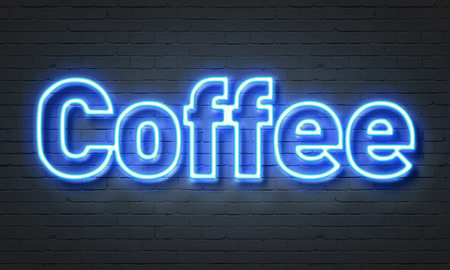 Coffee neon sign on brick wall backgroundの写真素材