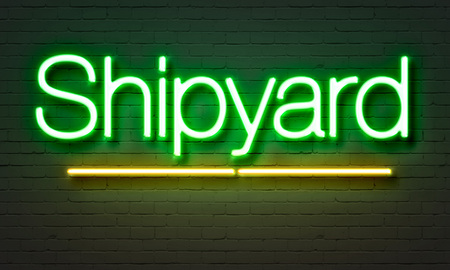Shipyard neon sign on brick wall backgroundの写真素材