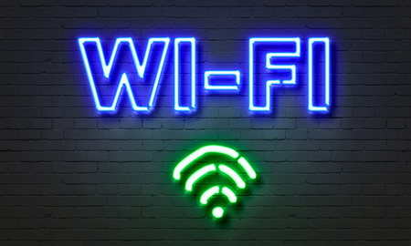 Wi-fi neon sign on brick wall backgroundの写真素材