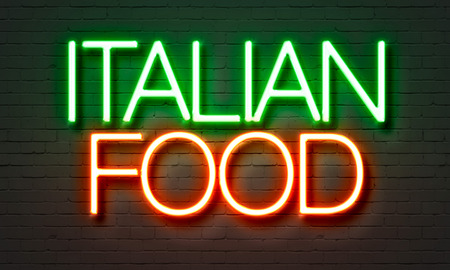 Italian food neon sign on brick wall backgroundの写真素材
