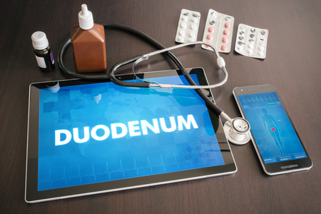Duodenum (gastrointestinal disease related organ) diagnosis medical concept on tablet screen with stethoscope.の写真素材