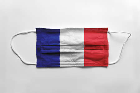 Face mask with France flag printed, on white background, isolated.の写真素材