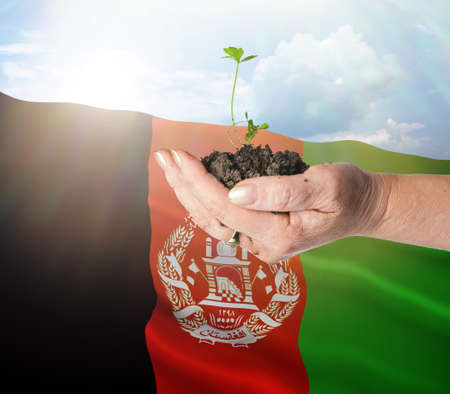 Afghanistan growth and new beginning. Green renewable energy and ecology concept.の写真素材