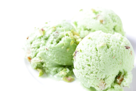 pistachio ice cream on a white background の写真素材