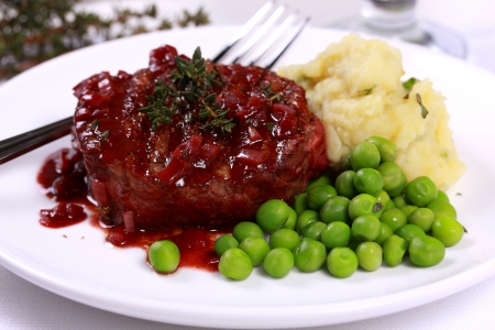 A piece of fillet with vegetables and wine sauce  の写真素材