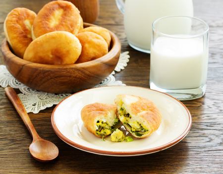Homemade cakes with egg and onion. Russian kitchen.の写真素材