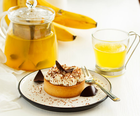 Banoffi tartlet with banana and caramel. Homemade baking. Selective focus.の写真素材