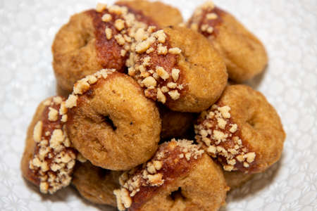 Savoury doughnuts, made with juicy British chicken breast, with barbecue sauce and waffle sprinkles.の写真素材