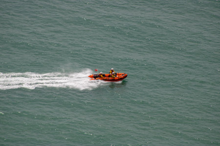East Sussex, Beachy Head, UK 10th July 2019: The HM Coastguard Rescue Boat Team and Sussex Police attending an incident on the cliff top at the most common suicide spots in the world, Beachy Headのeditorial素材