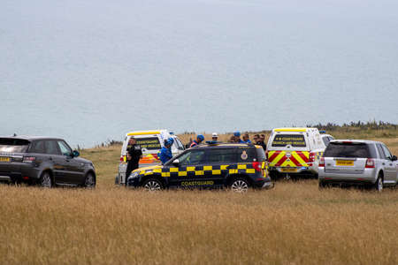 East Sussex, Beachy Head, UK 10th July 2019: The HM Coastguard Rescue Team and Sussex Police attending an incident on the cliff top of one of the most common suicide spots in the world, Beachy Headのeditorial素材