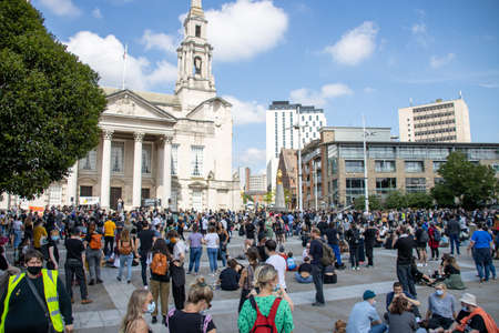 Leeds UK, 14th June 2020: Black lives matter protesters in the Leeds City Centre protesting about Black lives holding up signsのeditorial素材