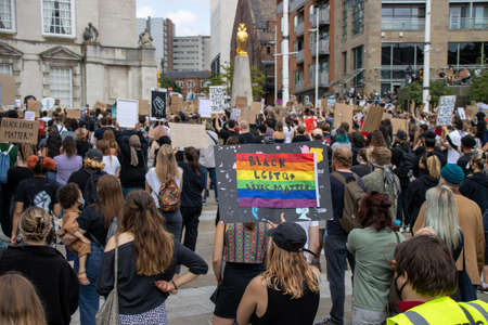 Leeds UK, 14th June 2020: Black lives matter protesters in the Leeds City Centre protesting about Black lives holding up signsのeditorial素材