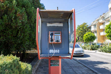 Obzor, Bulgaria 18th August 2019: Telephone box on the street of the town of Obzor, typical Bulgaria phone box.のeditorial素材