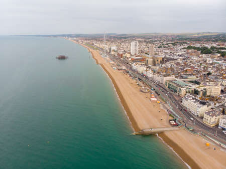 Aerial photo of the Brighton beach and coastal area located in the south coast of England UK that is part of the City of Brighton and Hove, taken on a bright sunny dayの写真素材