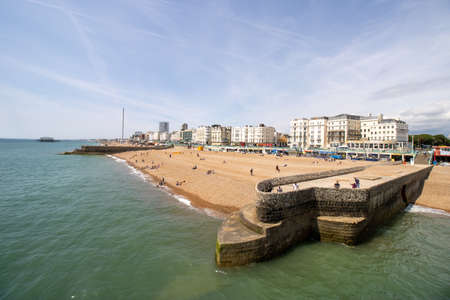 Brighton UK, 10th July 2019: The famous beautiful Brighton Beach and Seafront showing the coastline area on a bright sunny day,のeditorial素材
