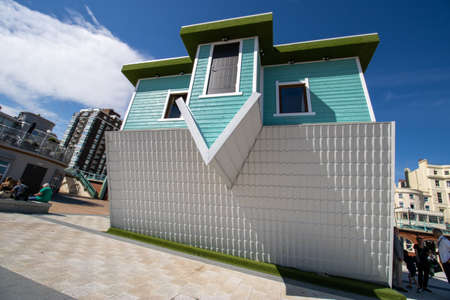 Brighton and Hove UK, 10th July 2019: The famous Upside Down House located on the coastal beach area...