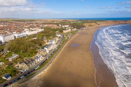 Aerial photo of the British seaside town of Filey, the seaside coastal town is located in East Yorkshire in the North Sea coast showing the beach and ocean.の写真素材