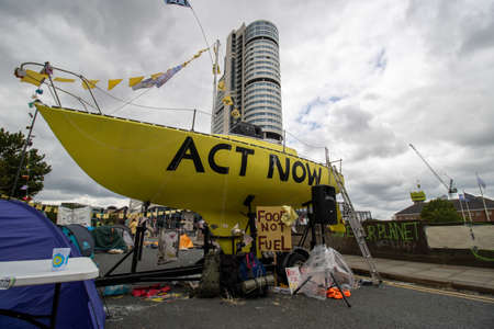 Leeds UK, 18th July 2019: The Extinction Rebellion Protest located in the Leeds City Centre on Victoria Bridge showing people holding signs about the protest.のeditorial素材