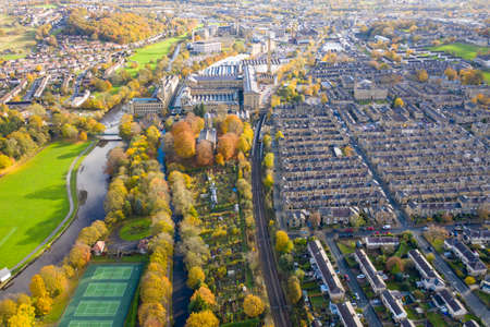 Aerial photo taken in the small town of Shipley in the City of Bradford, West Yorkshire, England showing the autumn fall colours of the hosing estates and roads in the town centre.の写真素材