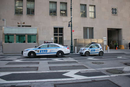 New York USA, 8th April 2019: A United States of America blue Police car from the NYPD traveling on a road in New York Cityのeditorial素材