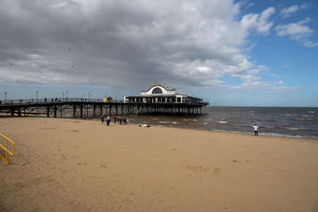 Cleethorpes, Lincolnshire UK, 31st July 2019: The beautiful beach at the ocean town of Cleethorpes the seaside resort on the estuary of the Humber in North East Lincolnshire, on a cloudy day.のeditorial素材