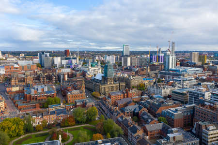 Aerial photo of the Leeds town centre in the UK showing the Leeds Town Hall with construction work being done on the towerのeditorial素材