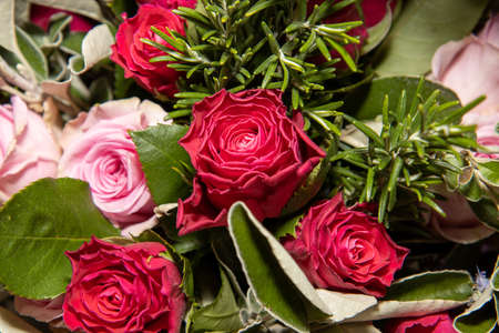 A beautiful bunch of colourful flowers, pink and red roses