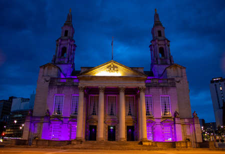 Leeds UK, 2nd June 2020: Night time photo of the Leeds Civic Hall lit up in purple in memory of...