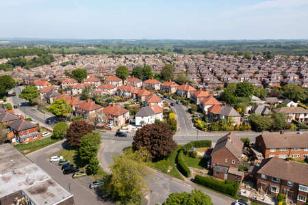 Aerial drone photo of the beautiful historical town of Harrogate, North Yorkshire in the UK showing the residential housing estates and rows of houses from above in the summer timeのeditorial素材