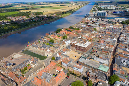Aerial photo of the beautiful town of King's Lynn a seaport and market town in Norfolk, England UK showing the main town centre along side the River Great Ouse on a sunny summers dayのeditorial素材