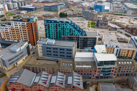 Aerial drone photo of a group of large apartment buildings just outside the Leeds City Centre in...