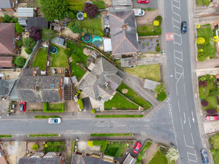 Aerial photo of the town of Batley in Yorkshire UK, showing a typical British housing estates with roads and streets, taken with a drone on a sunny day above the houses.のeditorial素材