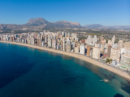 Aerial photo taken in Benidorm in Spain Alicante, showing the beautiful beach of Playa Levante and hotels, buildings, and high rise skyline cityscape.の写真素材